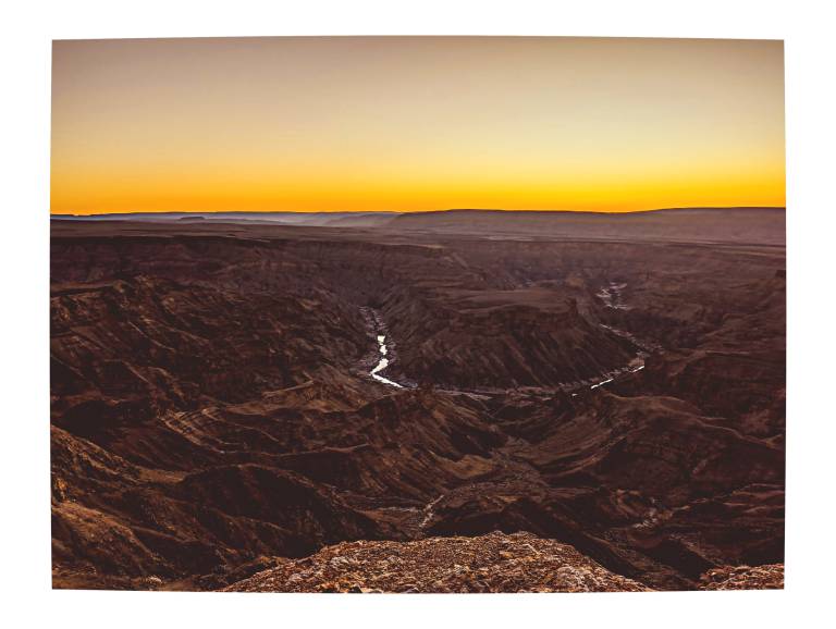 Sunset over Fish River Canyon, Namibia - Neil Pittaway